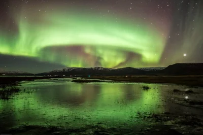 Join a northern lights 4x4 tour from akureyri. hunt auroras with a local guide, enjoy hot chocolate, and get free pick-up. retry if no lights appear.