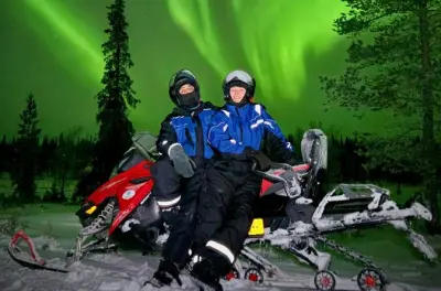 Hunt Northern Lights by Snowmobile in Rovaniemi