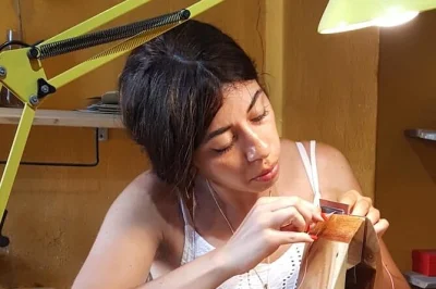 Hoi an, cidade antiga: crie seu souvenir de couro em oficina prática com artista local, materiais inclusos e bebida de boas-vindas.