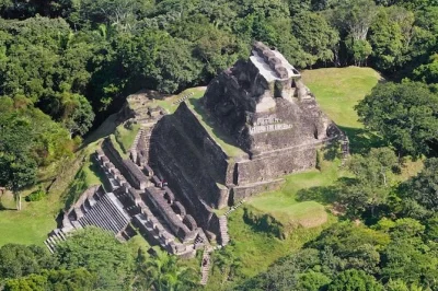 Experience belize’s xunantunich ruins and cave tubing adventure from placencia with a local guide. includes lunch, all gear, and round-trip pickup.