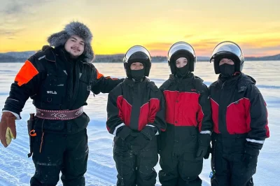 Ride snowmobiles across lake inari, meet reindeers on a local family island, and enjoy homemade lunch by the fire. includes hotel pickup, gear, and guide.