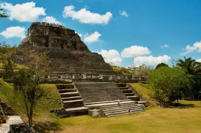 Visit xunantunich mayan ruins from belize city with a local guide, cross the mopan river by hand-cranked ferry, and enjoy an authentic belizean lunch. includes pickup.