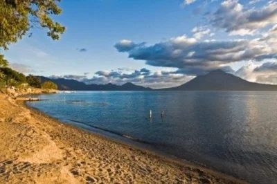 Discover lake atitlan’s volcanic scenery and maya culture on a guided sightseeing cruise from guatemala city. includes hotel pickup, boat tour, and time in panajachel.