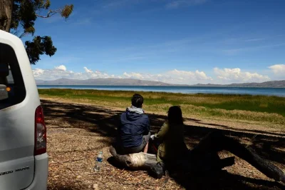 Discover tiwanaku’s ancient ruins and lake titicaca on a guided day trip from la paz. includes hotel pickup, english or spanish guide, and lakeside lunch.