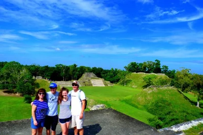Discover altun ha ruins and cave tubing at jaguar paw on a guided day trip from belize city. includes belizean lunch, all fees, and air-conditioned transport.
