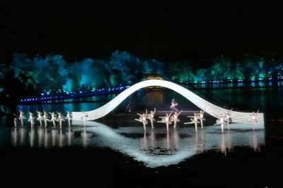 Experience hangzhou’s impression west lake show with hotel pickup, english ticket delivery, and a local guide. enjoy a dazzling water performance in the heart of the city.