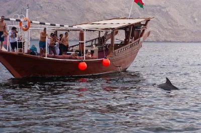 Drift through khasab’s musandam fjords on a traditional dhow cruise, spot dolphins, and snorkel at telegraph island. includes drinks, fruit, and local guide.