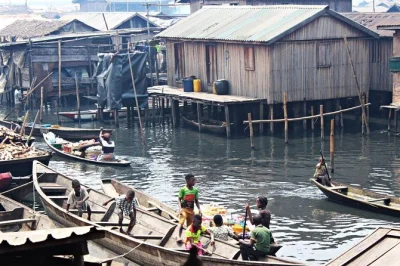 Experience lagos’s makoko floating village by canoe with a local guide. includes hotel pickup, private transportation, and all fees. discover daily life on the water.