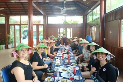 Experience a hands-on vietnamese cooking class near ho chi minh city, explore an organic farm in cu chi, and learn from local chef tan. includes pickup & lunch.