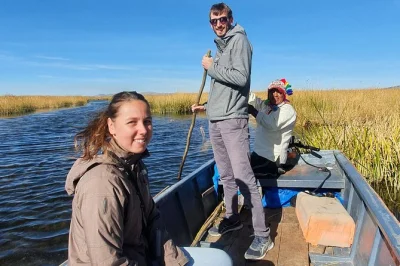 Experience lake titicaca’s uros islands with a local guide—cut reeds, set fishing nets, and meet islanders. includes hotel pickup and hands-on cultural activities.