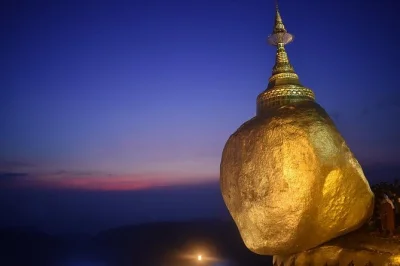 Experience myanmar’s golden rock from yangon with a friendly local guide, private car, and lunch included. join pilgrims, see bago, and enjoy easy pickup.