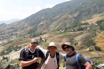 Experience sapa’s rice terraces, meet black hmong & red dzao villagers, enjoy a traditional lunch, and trek peaceful mountain paths with a local guide. includes pickup.