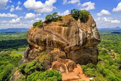 Experience sigiriya rock fortress, dambulla cave temple, and a spice garden on a private day trip from kandy with hotel pickup, bottled water, and friendly local driver.