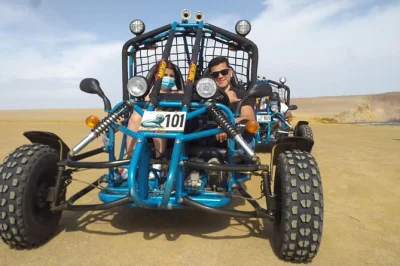 Explore paracas national reserve by minibuggy with a local guide, stopping at yumaque beach, red beach, and the peninsula viewpoint. includes helmets & instructions.