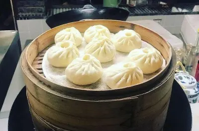 Aula de baozi em Xi'an: Aprenda a fazer pão cozido no vapor