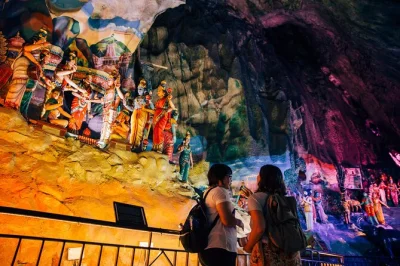Experience batu caves near kuala lumpur with a local guide, hotel pickup, and entry included. discover hidden details, cultural stories, and the famous lord murugan statue.