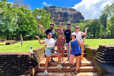 Experience sigiriya lion rock, minneriya elephant safari, and dambulla cave temple on a private day trip from colombo with local guide, pickup, and refreshments.