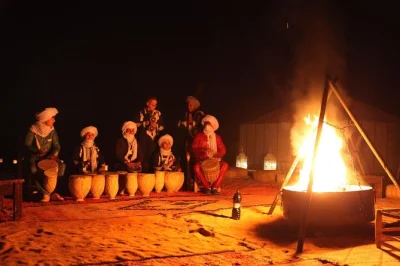 Experience morocco’s sahara desert, berber villages, and ancient kasbahs on a private 3-day tour from fes to marrakech with local guide, camel trek, and hotel pickup.