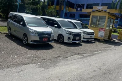 Arrive in montego bay with a local welcome, private airport transfer, air-conditioned ride, bottled water, and a bonus city tour for groups of six or more.