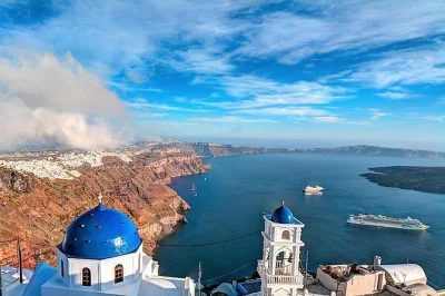 Explore santorini with a local guide, visit red beach, oia, and a monastery, plus enjoy wine tasting. includes hotel pickup and private transport.
