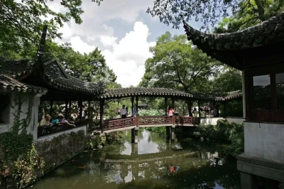 Experience suzhou’s historic gardens, ancient panmen gate, and silk museum on a private day trip from shanghai with flexible pickup and authentic local lunch.
