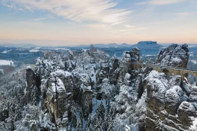 Experience saxon & bohemian switzerland from dresden, hike bastei bridge and pravčická gate or tisá rocks, with local lunch and hotel pickup included.