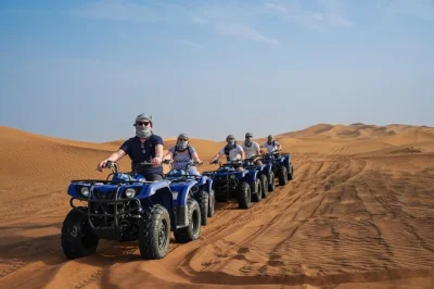 Partez en quad yamaha 350cc dans le désert de dubaï, testez le sandboard, profitez d’un safari à dos de chameau et rafraîchissez-vous avec des boissons fraîches. transfert hôtel en 4x4 inclus.