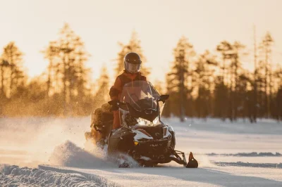 Explore lapland’s wild backwoods on a full-day snowmobile safari from rovaniemi, with pickup, winter gear, and a lappish campfire lunch included.