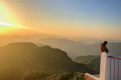 See sunrise over the himalayas from kunjapuri temple, trek down to rishikesh, enjoy breakfast, and relax with included pickup and local guide.