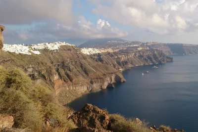 Watch blue domes glow in oia, walk akrotiri’s ancient ruins, taste volcanic wine, and wander castle lanes—private santorini tour with flexible pickup & local guide.