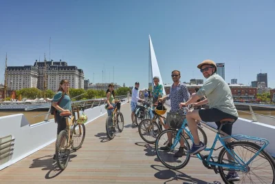 Feel the pulse of buenos aires on a small group bike tour through san telmo, la boca, and puerto madero—includes snacks, mate stop, and english-speaking guide.