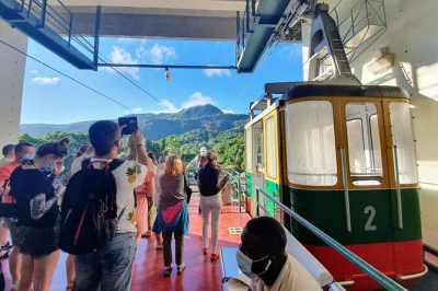 Scopri puerto plata: sali sulla funivia del monte isabel, passeggia tra le vie coloniali, assaggia rum e cioccolato dominicani. pranzo e trasporto privato inclusi.