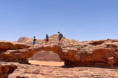 Wadi Rum Jeep Tour: Crimson dunes, canyons and ancient carvings