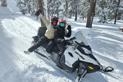 Feel the rush of snowmobiling in the sierra near reno & lake tahoe, with hotel pickup, gear help, and local guides who know every trail. includes snacks.