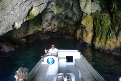 Step onto a boat in syracuse for a relaxed cruise to ortigia and the sea caves, with time to snorkel clear waters. includes guide and easy meeting point.
