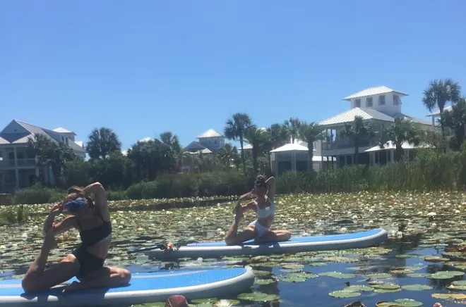 Floating Yoga on Paddleboards in Panama City: Guided practice on the water