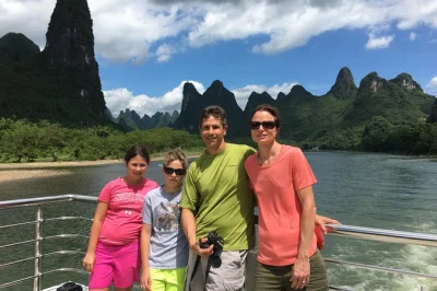 Float past karst peaks on a li river cruise from guilin to yangshuo, with reserved seats, hotel pickup, and free time on west street. includes e-ticket delivery.