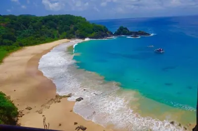 Fernando de Noronha boat tour: Dolphins, snorkel & Sancho Beach