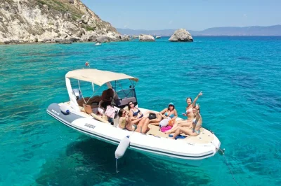 Feel the sea breeze on a fast cagliari boat tour, swim in clear coves by sella del diavolo, sip sangria, and maybe spot dolphins. includes skipper & drinks.