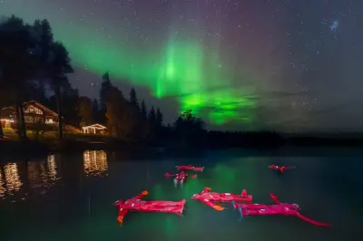 Float in Frozen Lake Aurora Borealis: Rovaniemi Northern Lights