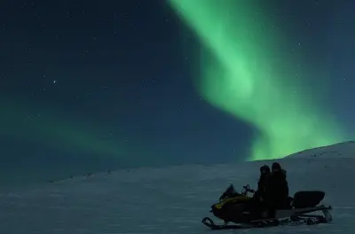 Aurora Snowmobile Adventure in Kiruna: Drive or Ride