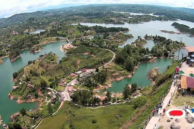 Feel the color of guatape, climb el peñol rock, and wander lakeside streets on this private day trip from medellin with hotel pickup and all entry fees included.