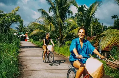 Can Tho de bicicleta: Pomar de fruta do dragão e balsa local