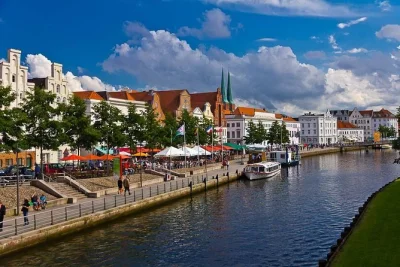 Explore lübeck’s holsten gate, buddenbrookhaus, and wismar’s st. george’s church on a private shore excursion with local guide and port drop-off.