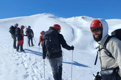 Climb quetrupillán volcano with expert guides from pucón. includes gear, transport, snacks, and glacier views. perfect for beginners and hikers.