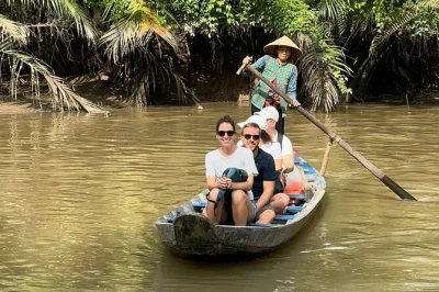Start your ben tre day trip with a boat ride through mekong canals, taste fresh fruit, visit a coconut workshop, and explore by xe loi or bike—pickup included.
