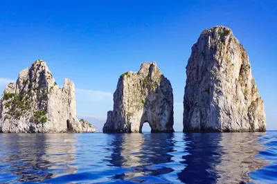 Feel the sea air on a capri & blue grotto small group tour from naples or sorrento, with ferry tickets, local guide, island minibus, and pickup included.