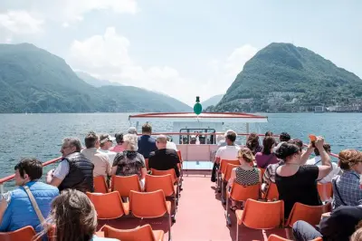 Lugano–Gandria Wanderung mit Bootsrückfahrt und Olivenwegblicken