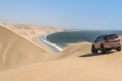 Sandwich Harbour Tour from Walvis Bay: Desert Meets Ocean
