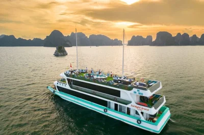Descubra a magia da baía de halong com um cruzeiro de luxo — explore a gruta sung sot, faça caiaque sob os penhascos de calcário, saboreie um buffet de frutos do mar e relaxe com traslado incluso